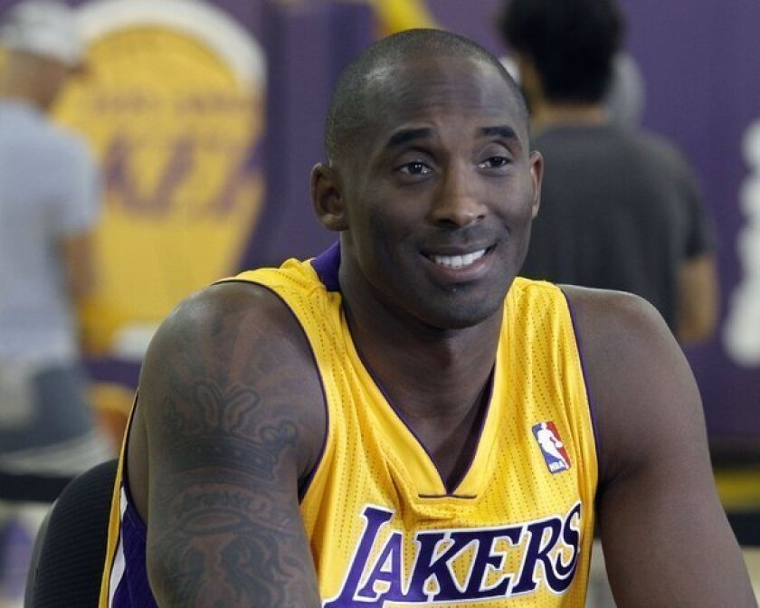 Kobe Bryant signed a two-year extension with the Lakers on Monday.