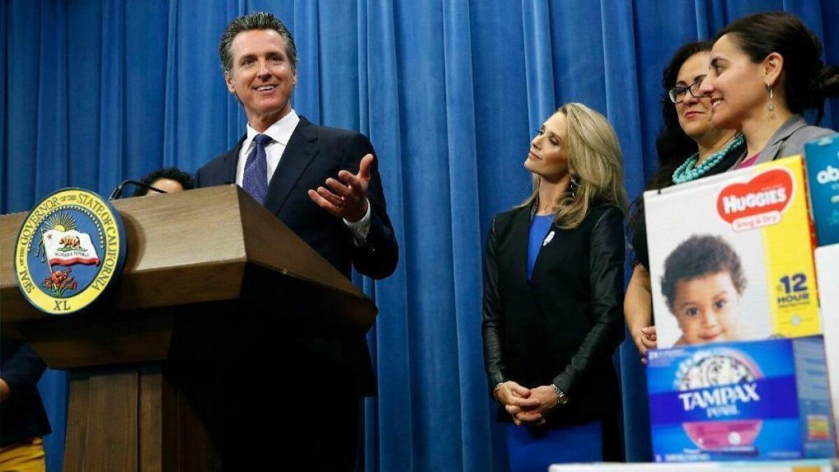 California Gov. Gavin Newsom discusses a proposal to eliminate the state sales tax on diapers and menstrual products in a news conference in Sacramento on May 7.