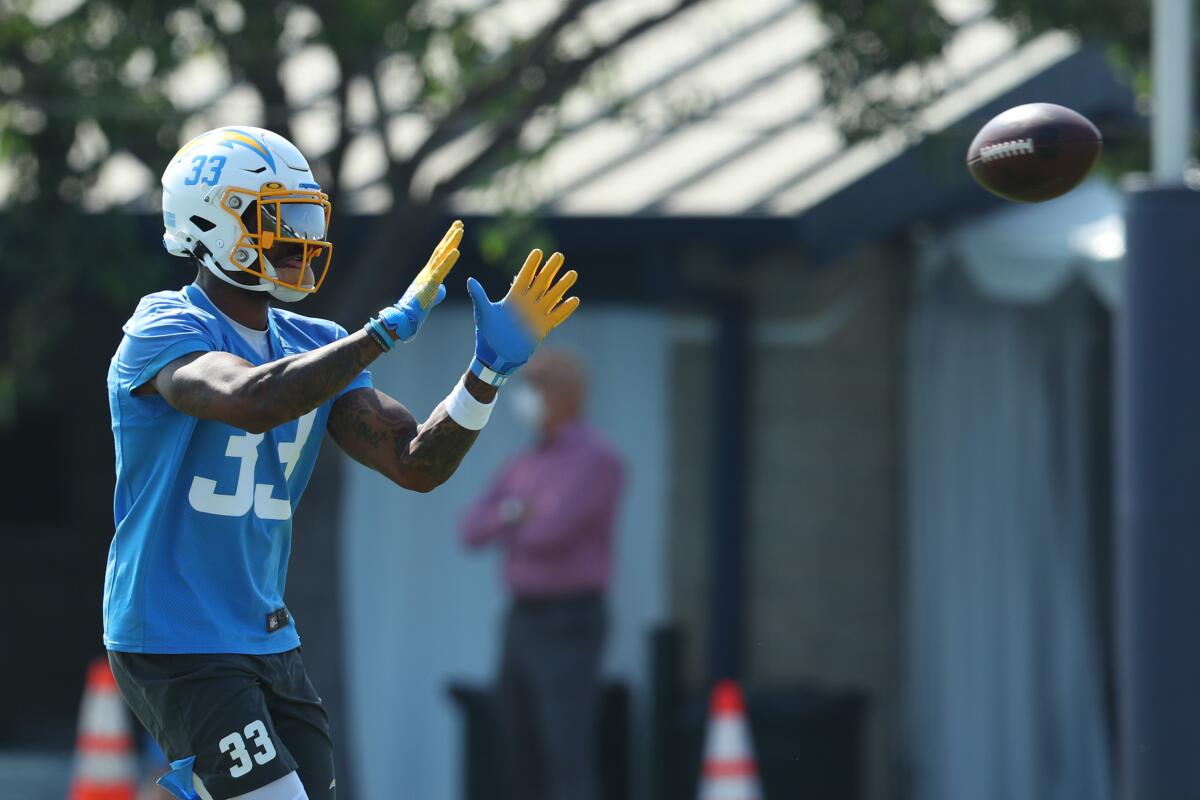 Derwin James has a catch during a Chargers camp practice.