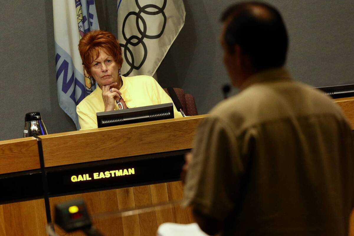 Anaheim City Councilwoman Gail Eastman listens to public comments before the start of the City Council meeting. The council proposed a change to its electoral system, but some say the measure won't achieve a goal of more Latino representation.