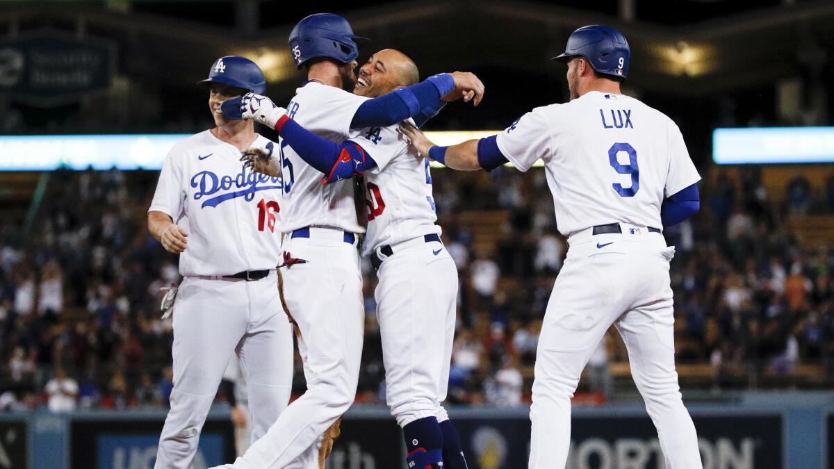 The Sports Report: Dodgers rally for walk-off win over Rockies, extend lead  in NL West - Los Angeles Times