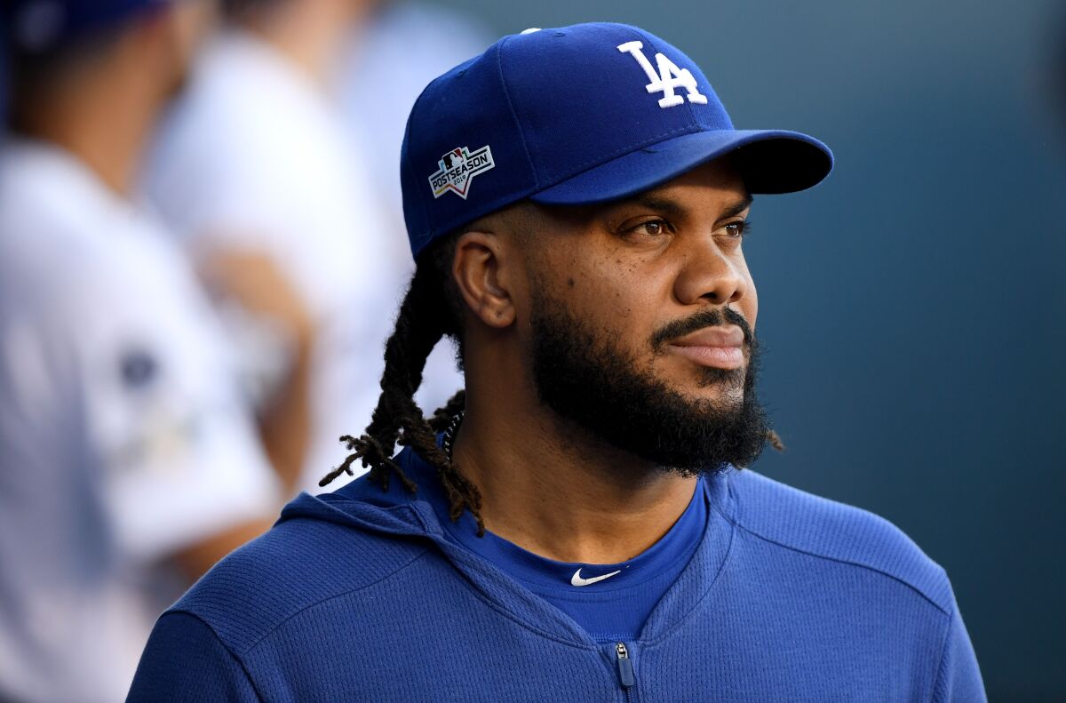 Dodgers pitcher Kenley Jansen looks on from the dugout at Dodger Stadium on Thursday.