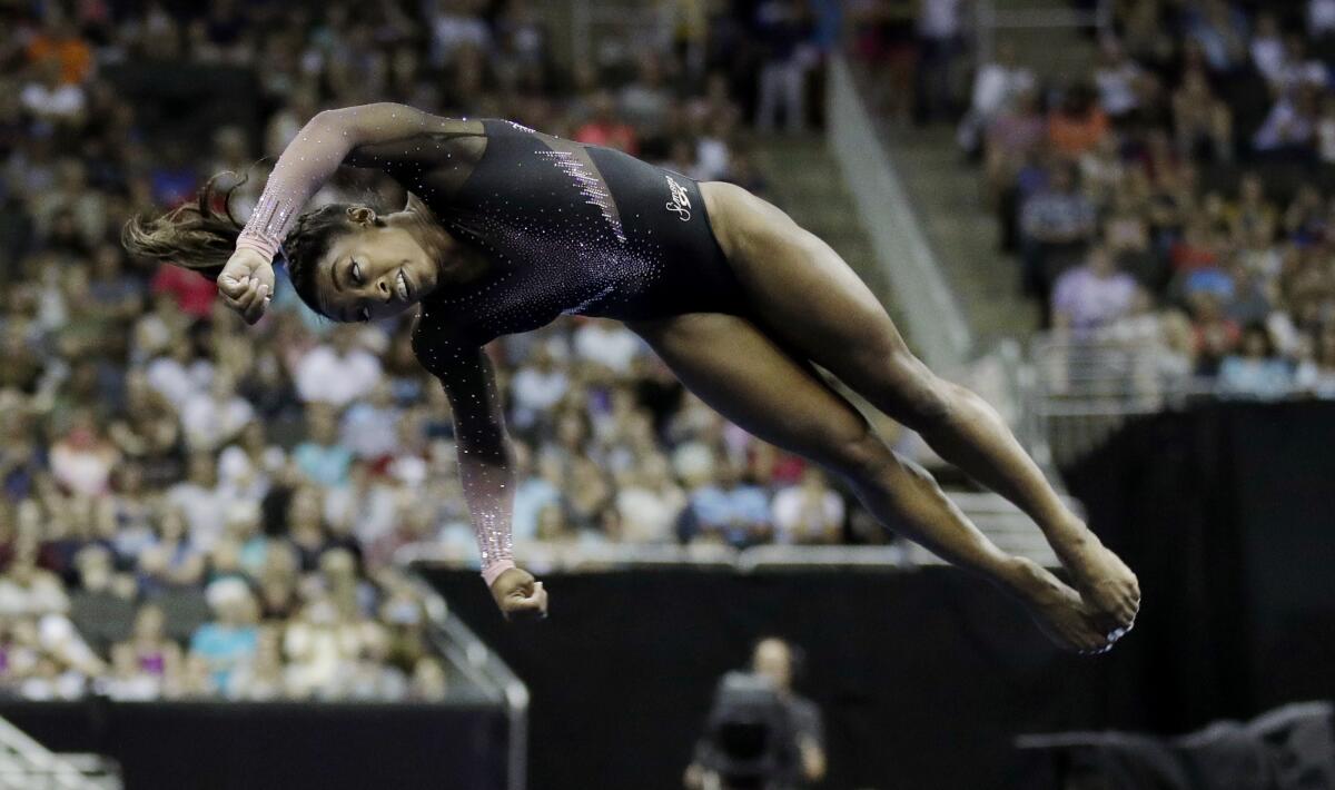 Simone Biles competes in the floor exercise.