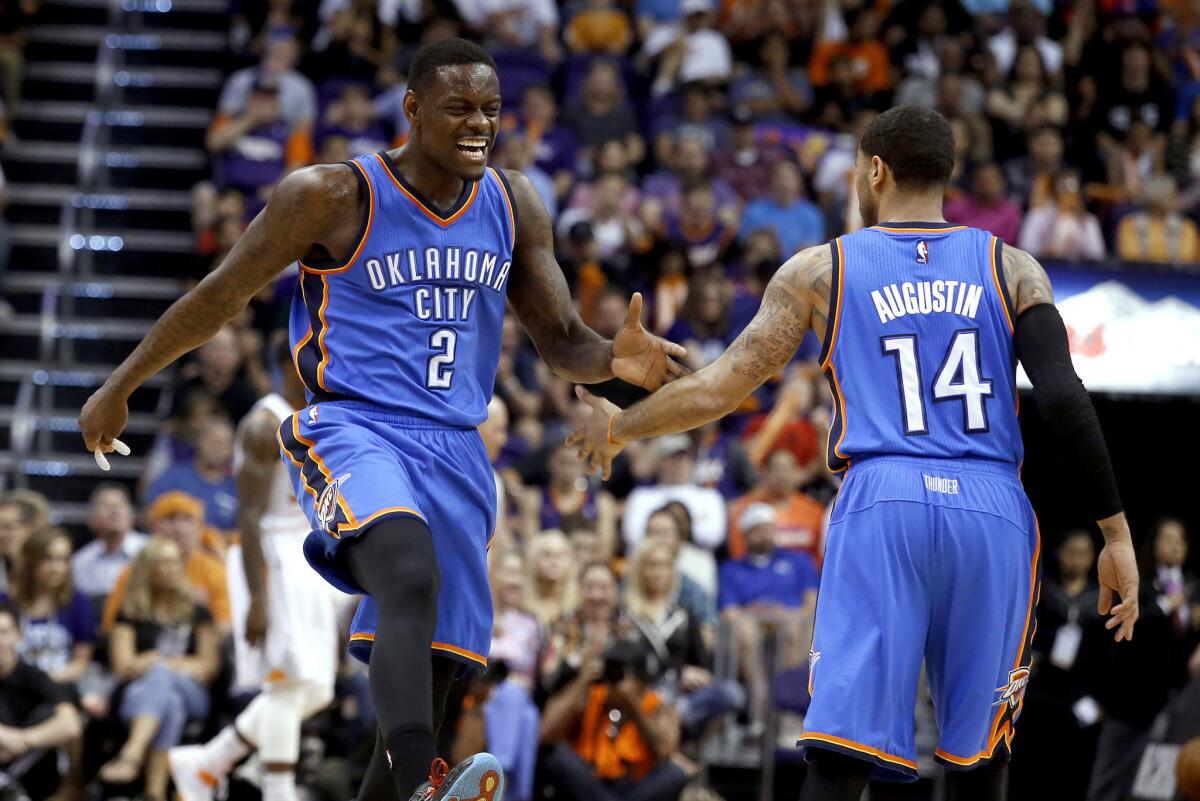 Thunder guard Anthony Morrow celebrates with point guard D.J. Augustin after scoring in the third quarter.