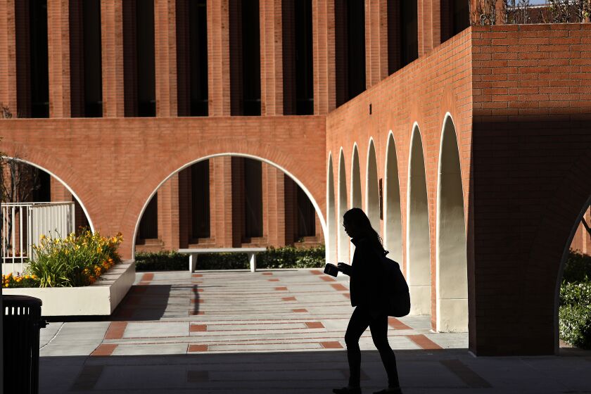 A person walks on the USC campus in 2018. The school was the top destination for foreign students in California last year.