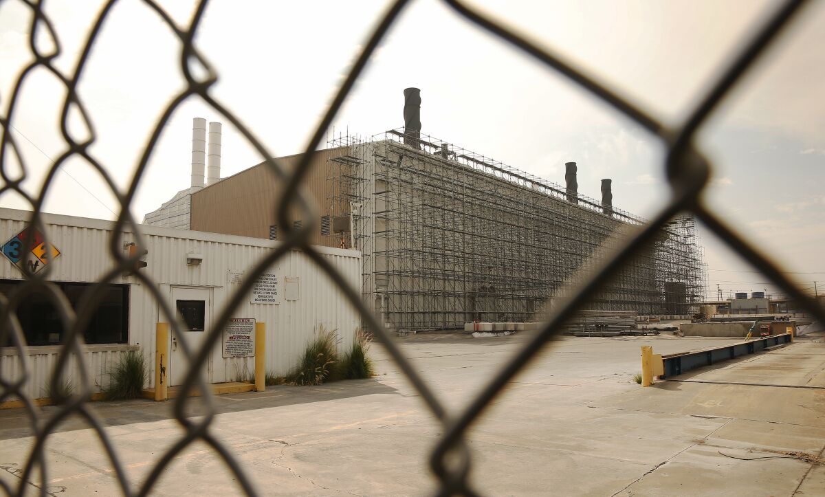The former Exide battery recycling plant in Vernon, seen through a chain-link fence