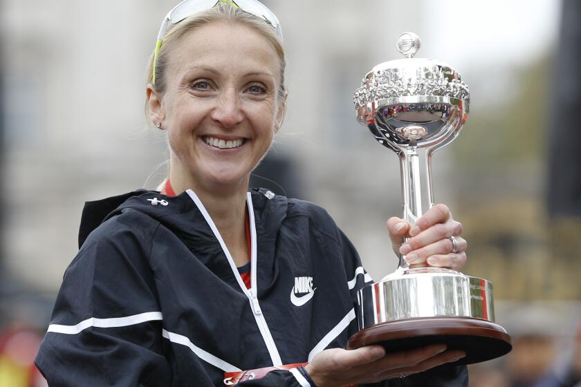 British athlete Paula Radcliffe receives a lifetime achievement award at the London Marathon in April.