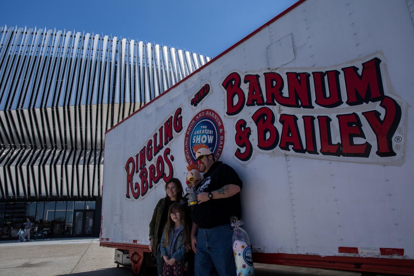Brandon Barre with wife Kristen and kids Billy, 14, and Keira take family picture as they leave after afternoon show of the Ringling Bros. and Barnum & Bailey Circus at the Nassau Coliseum on Long Island in Uniondale, New York.