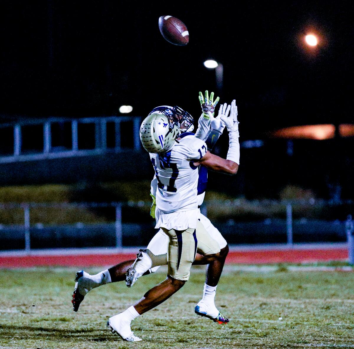 Peyton Waters of Birmingham makes an over-the-shoulder catch for an interception against Venice.