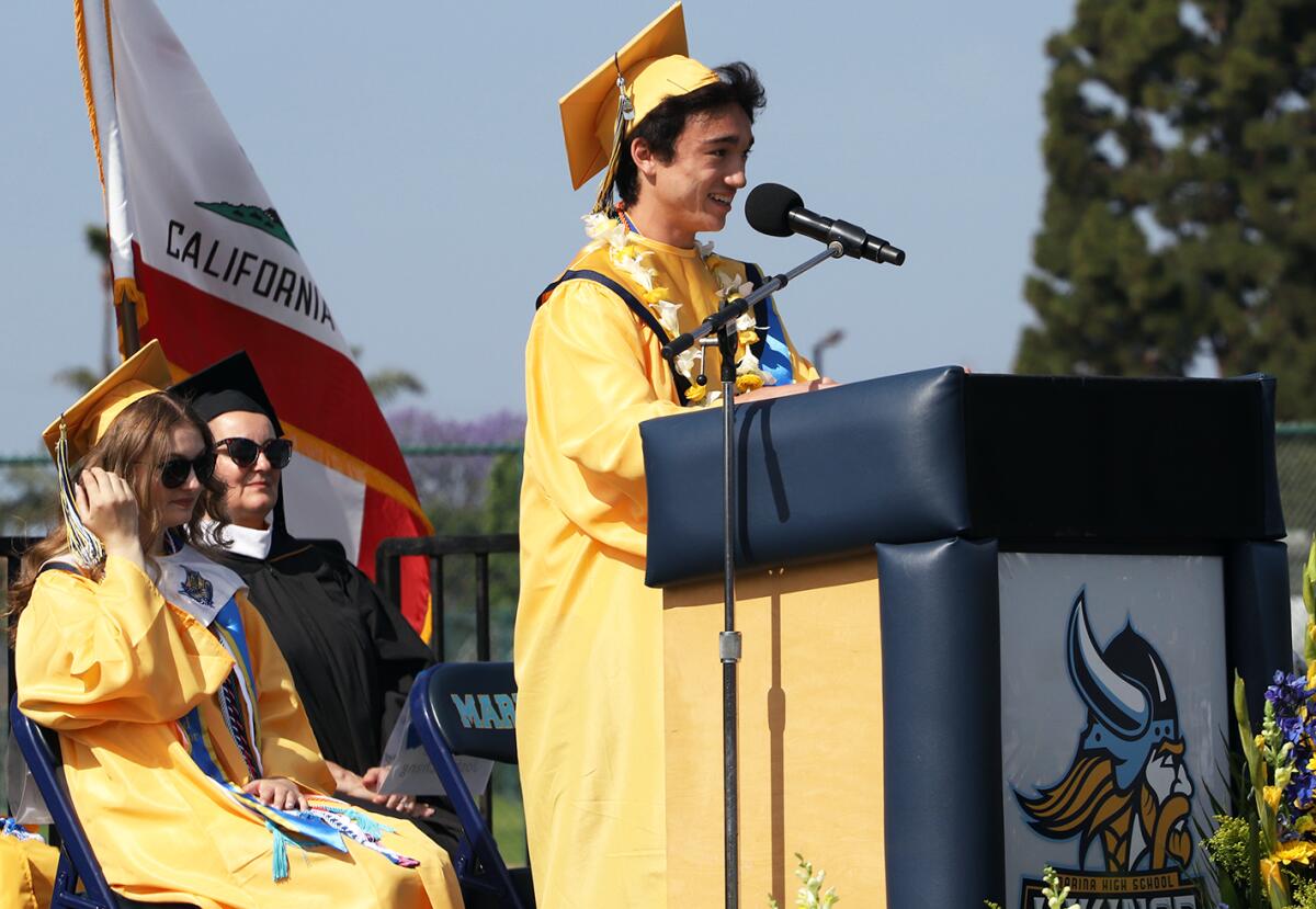Marina High School summa cum laude senior speaker Joshua Chang White addresses the crowd.