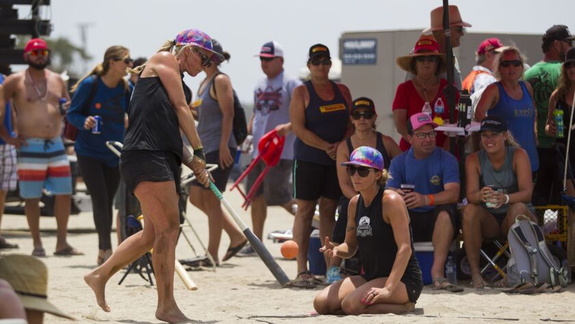 In this photo from the 2017 Over-the-Line competition, Whitney Benjamin of the Valley Farm Market team hits a pitch from teammate Savannah Johnson. The 2018 Over-the-Line competition kicks off July 14 on Fiesta Island.