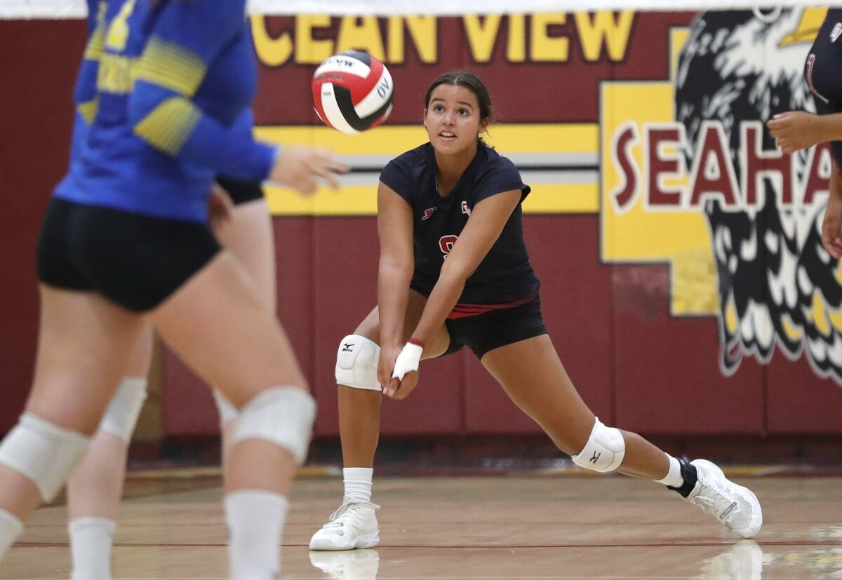Ocean View's Brooke Abascal digs a ball to keep a long rally going against Fountain Valley.