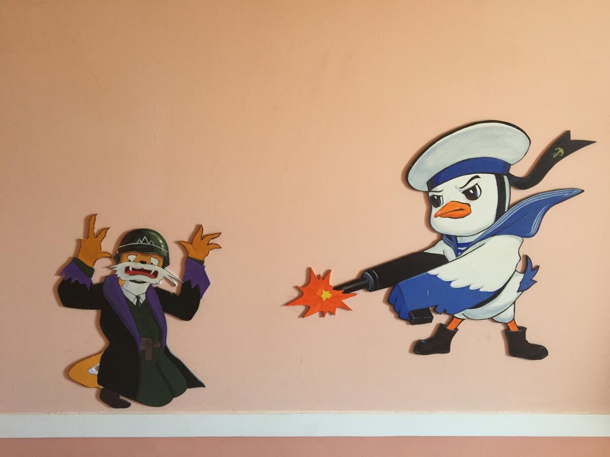 A duck character from the animated series "Squirrel and Hedgehog" is featured on the wall of the Changchon nursery school.