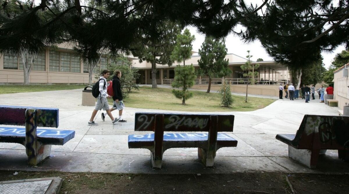 Students walk on the campus of La Jolla High School in 2019. 