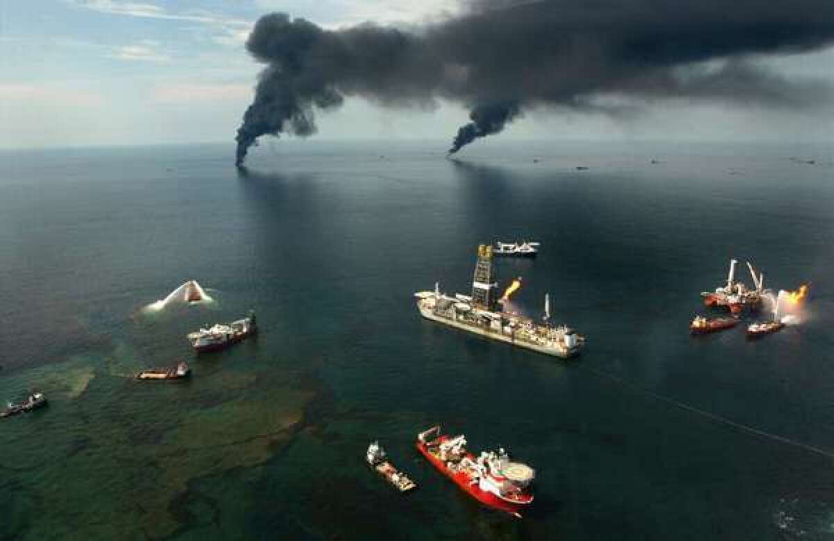 Fires burn around the site of the BP Deepwater Horizon rig, scene of the worst offshore oil spill in U.S. history.