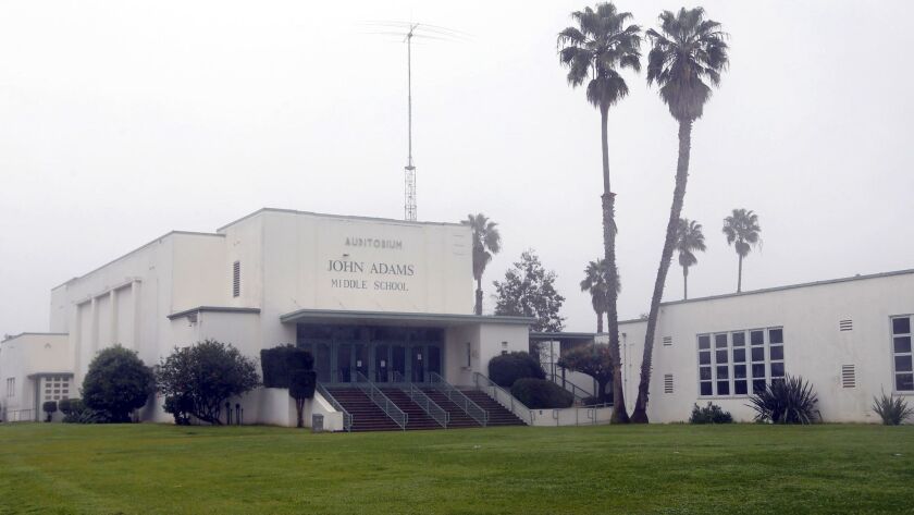 John Adams Middle School in Santa Monica reopened Monday after crews sanitized surfaces in the school in an effort to eradicate any traces of a gastrointestinal virus that sickened some students last week.