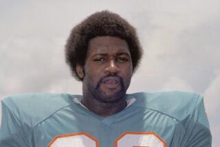 Miami Dolphins running back Eugene "Mercury" Morris shown in 1972. (AP Photo, file)