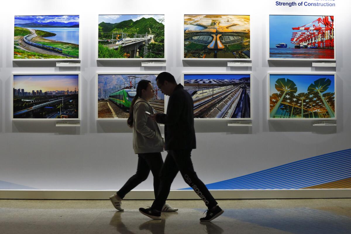 A display board showcases projects at the media center of the Belt and Road Forum in Beijing in 2019.