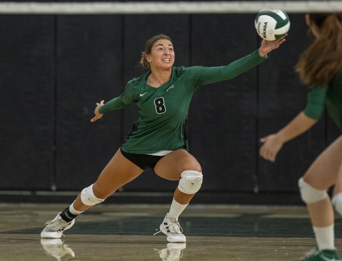 Sage Hill's Brooke Thomassen digs a ball during a season opener against Corona del Mar on Tuesday.
