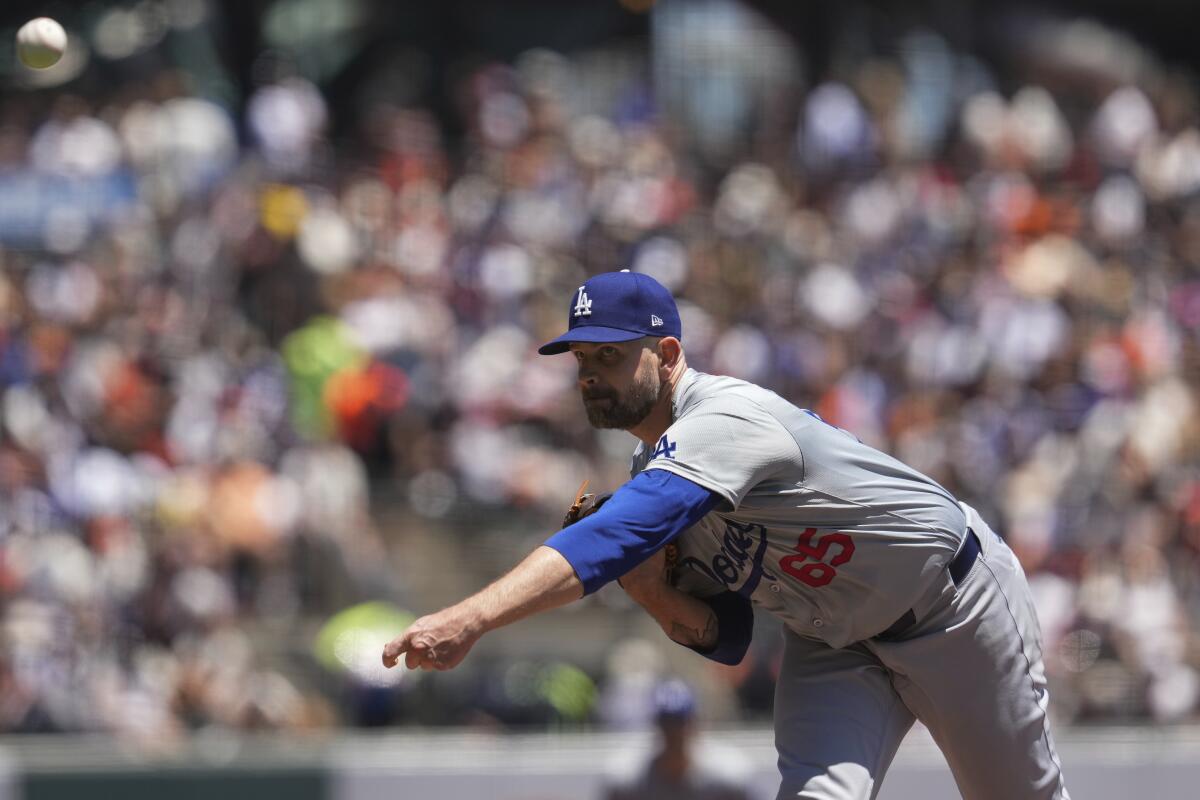 Dodgers pitcher James Paxton delivers in the first inning of a loss to the San Francisco Giants at Oracle Park.