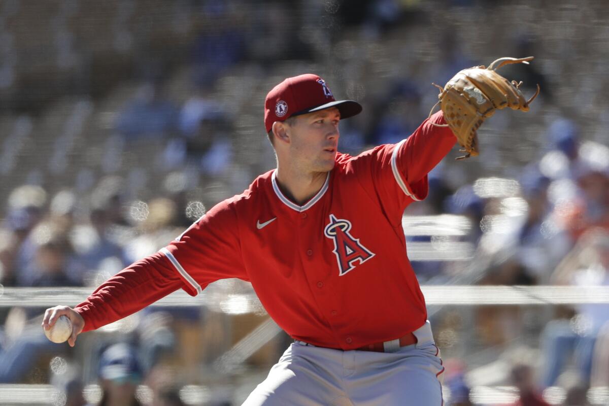 Angels starting pitcher Griffin Canning throws during a spring training game in February.