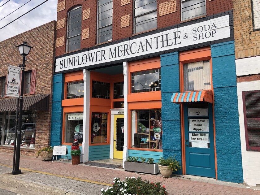 Storefronts line the town square in Carthage, Texas