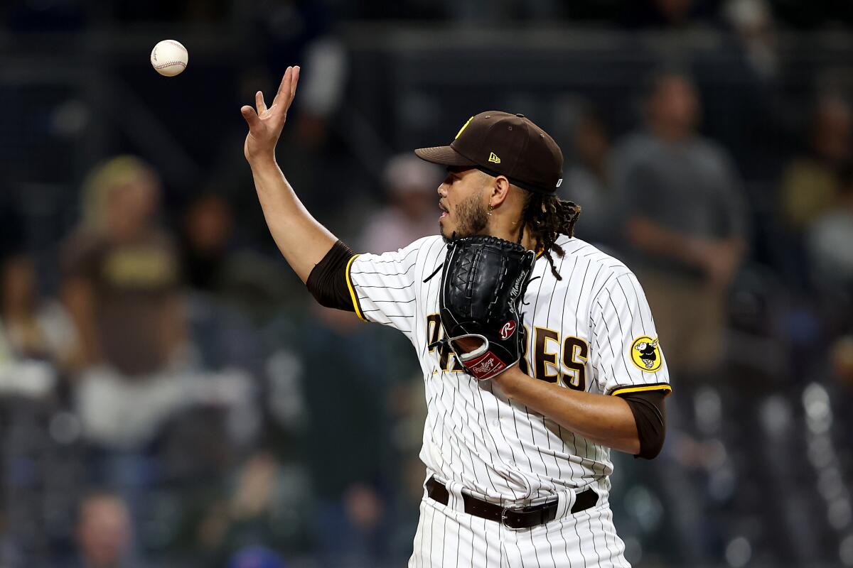 Robert Suarez of the San Diego Padres pitches in the eighth inning News  Photo - Getty Images