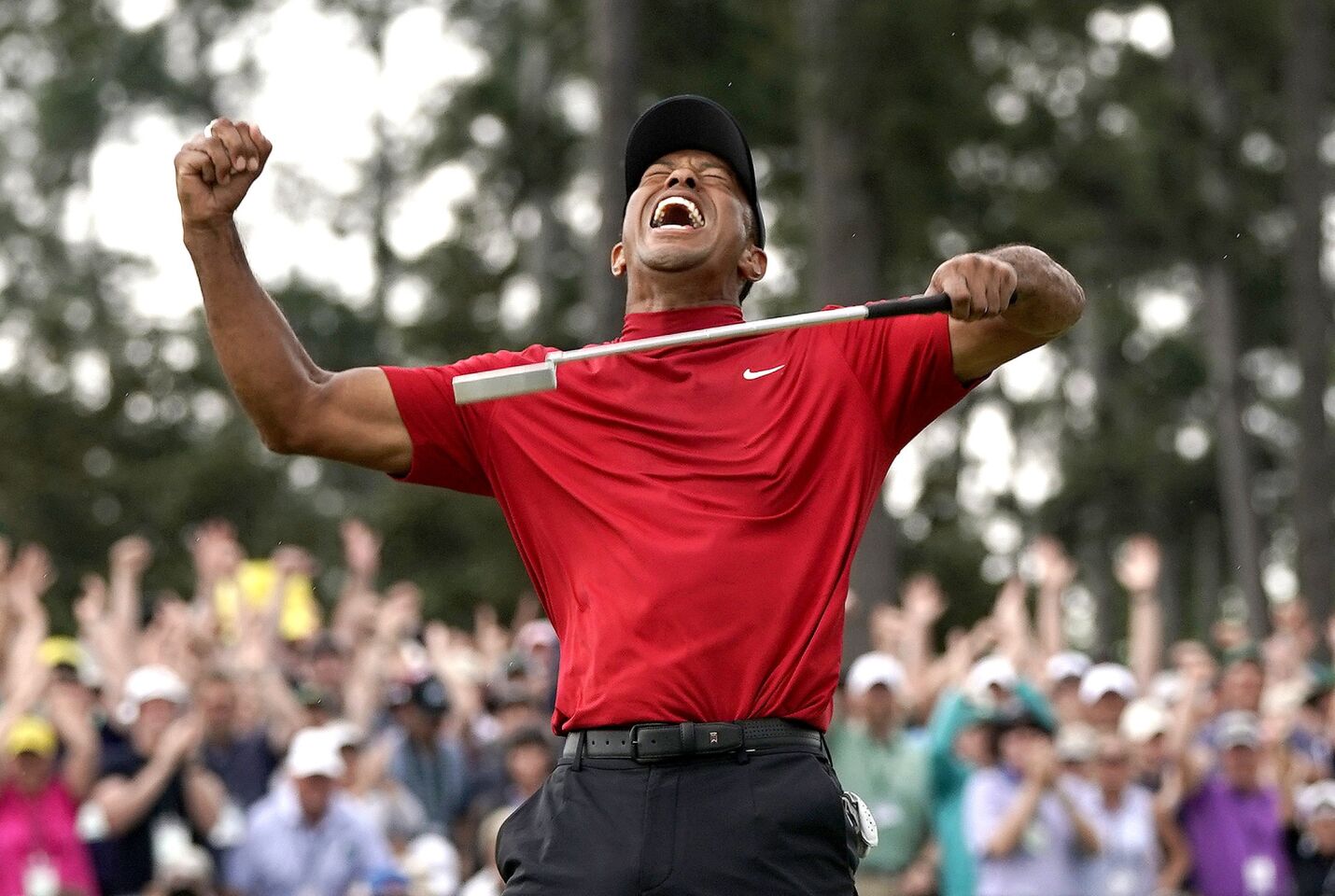 Tiger Woods reacts as he wins the Masters golf tournament Sunday in Augusta, Ga.