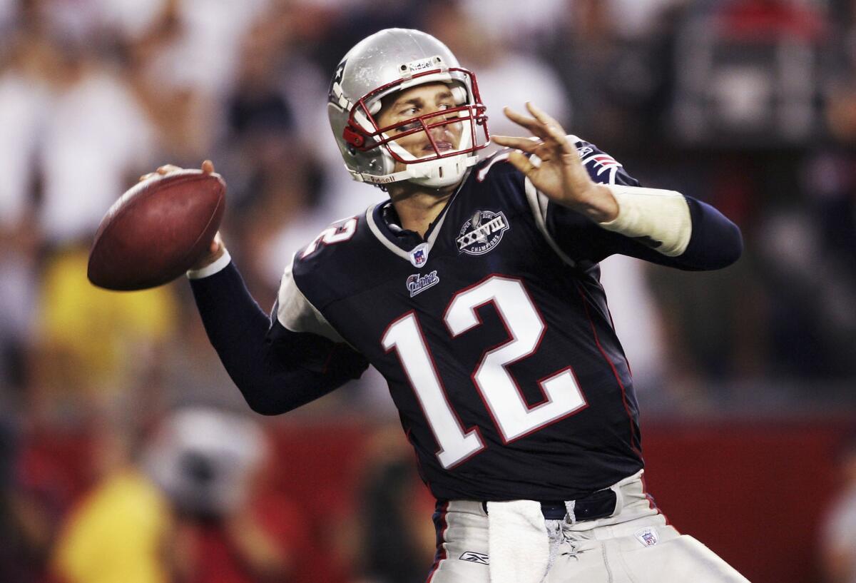 New England quarterback Tom Brady throws a pass against the Indianapolis Colts at Gillette Stadium in 2004.