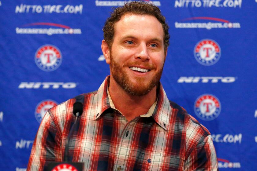 Texas Rangers introduced Josh Hamilton on Monday. Hamilton was acquired from the Angels.
