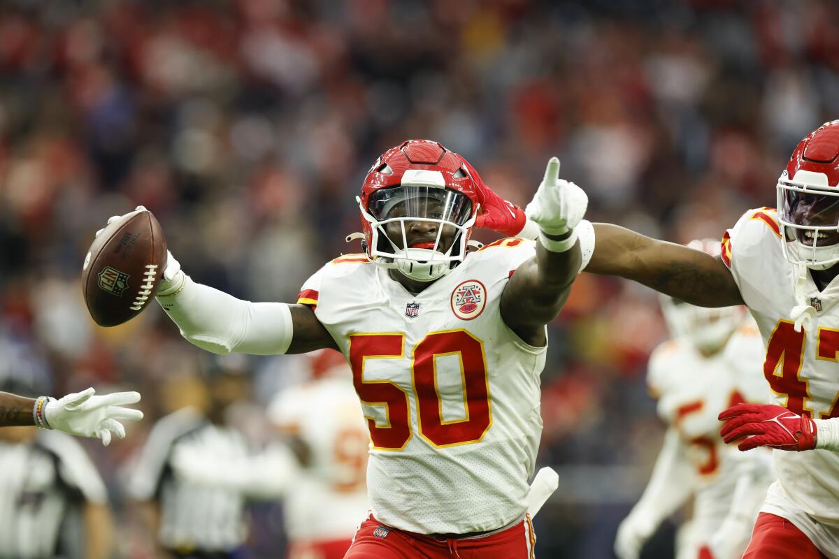 Kansas City Chiefs linebacker Willie Gay celebrates after a fumble recovery against the Houston Texans.