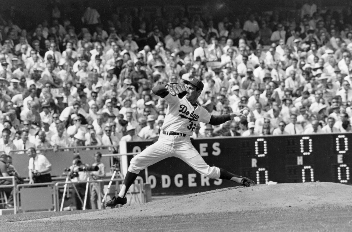 Dodgers starter Sandy Koufax pitches against the Baltimore Orioles in Game 2 of the 1966 World Series.