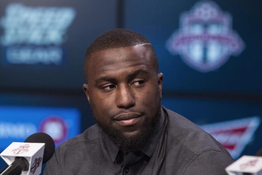 Jozy Altidore is introduced at a news conference Friday after signing with Major League Soccer's Toronto FC.