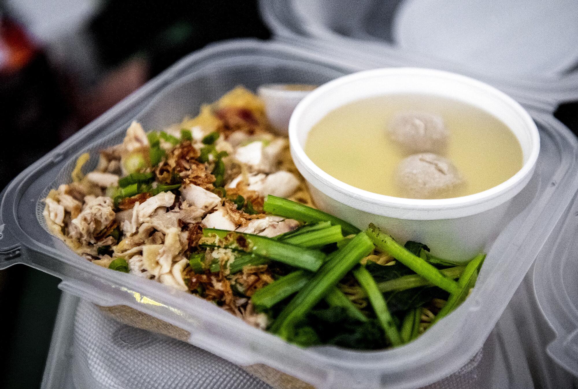 Bakmi Ayam Kampung, served by members of the church, "Favor of God", during the Christmas bazaar.