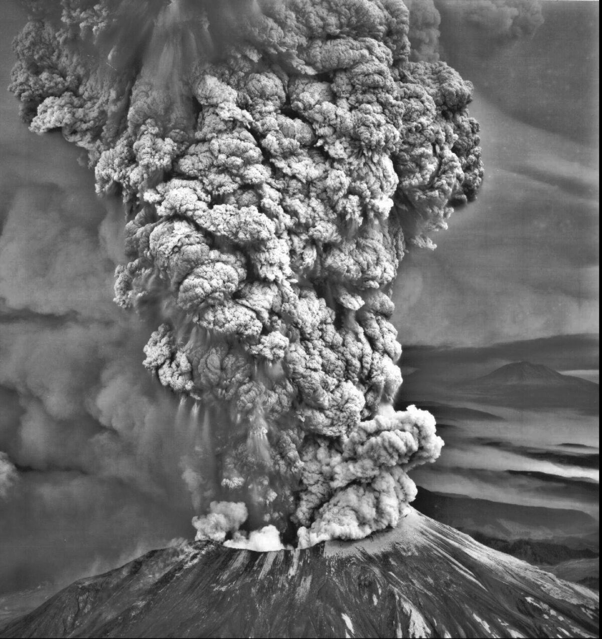 Mt. St. Helens erupted on May 18, 1980, sending a column of ash 15 miles high in less than 15 minutes, which caused complete darkness in Spokane, 250 miles east.