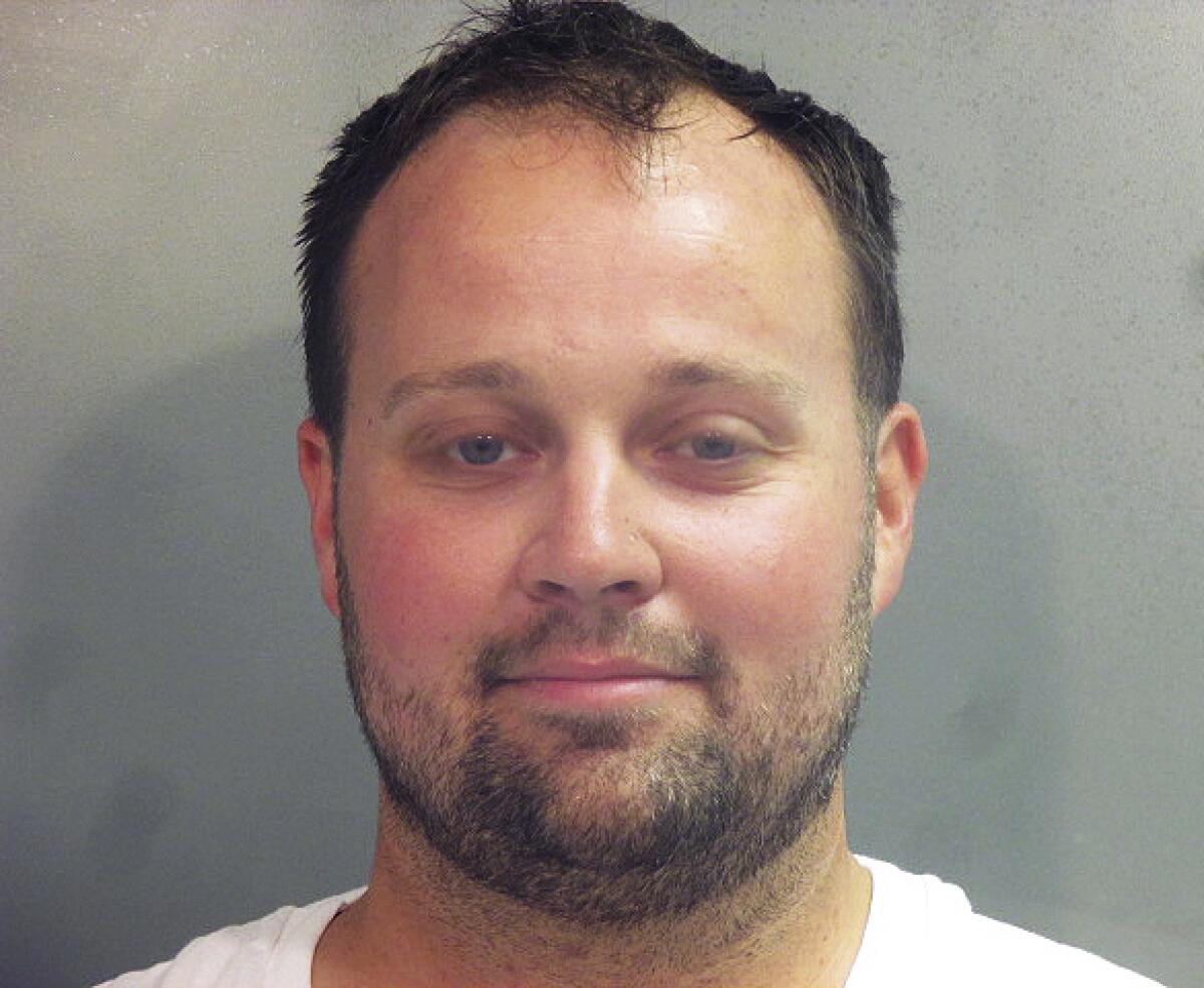 FILE - This photo provided by the Washington County (Ark.) Jail shows Joshua Duggar. On Wednesday, May 5, 2021, a judge ordered that former reality TV star Duggar be released as he awaits trial on charges that he downloaded and possessed child pornography. District Judge Christy Comstock ordered Duggar confined to the home of family friends who have agreed to serve as custodians during his release. (Washington County Arkansas Jail via AP, File)