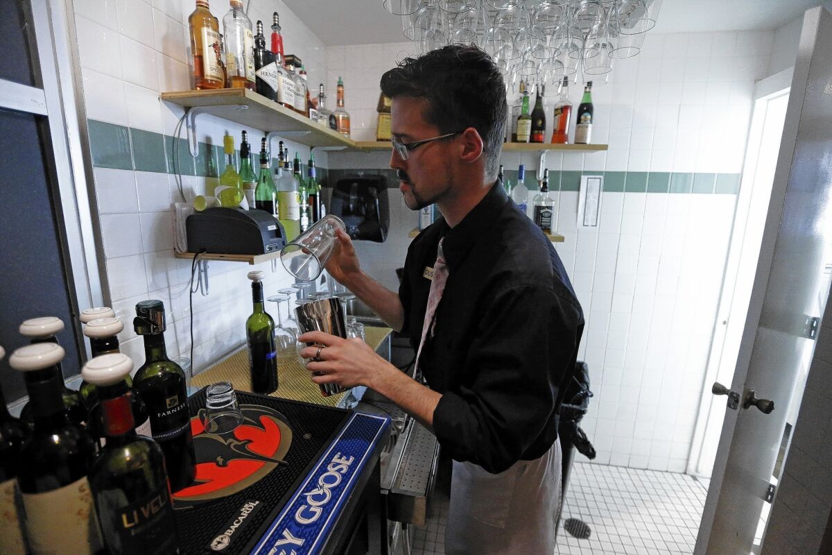 An alcoholic drink is prepared out of view of customers, in compliance with state law, at Vivace Restaurant in Salt Lake City. A bill introduced this year seeks to lift the state's Mormon Church-backed restrictions on drinking.