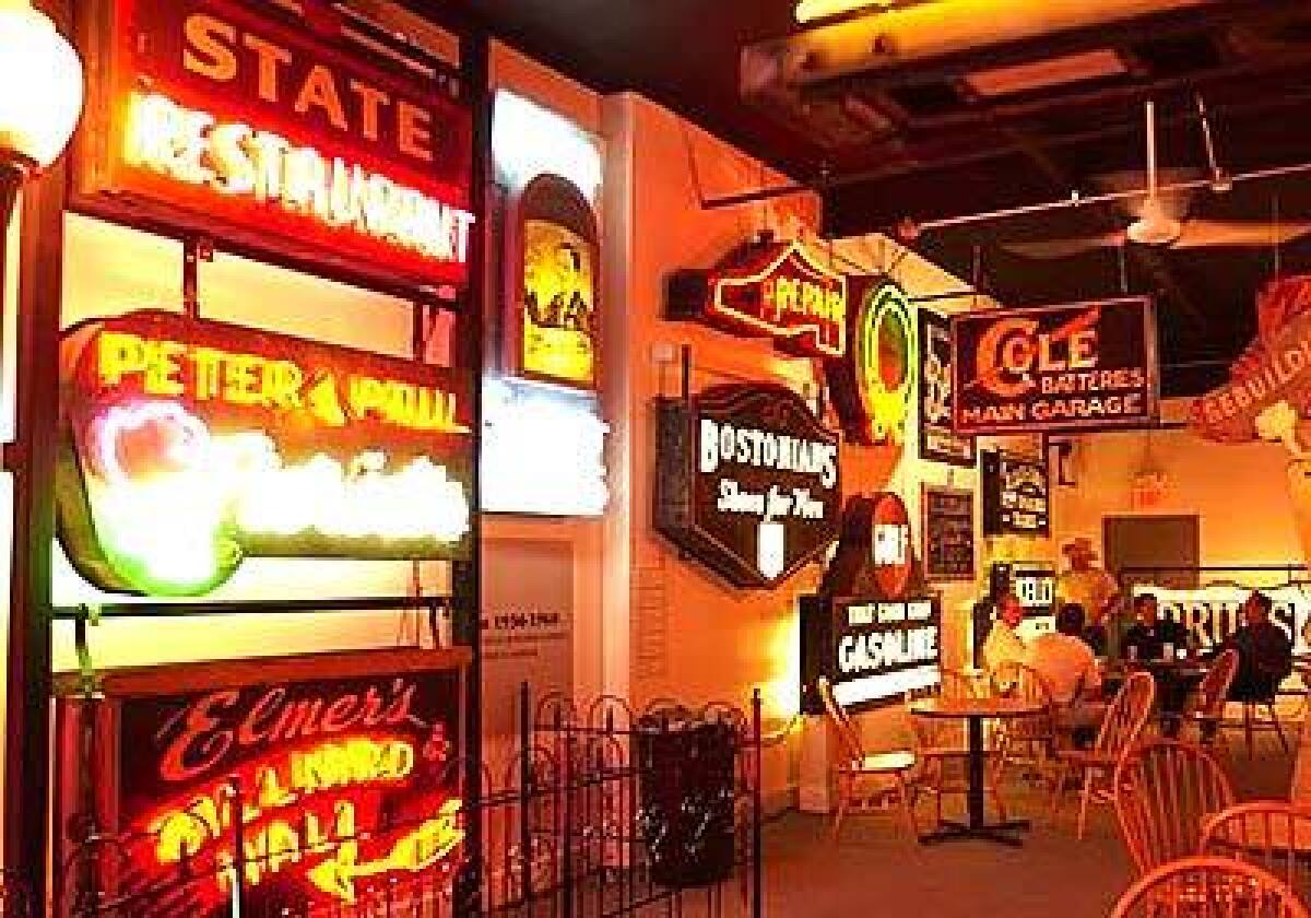 The American Sign Museum displays signs lighted by bulbs as well as examples of early neon.