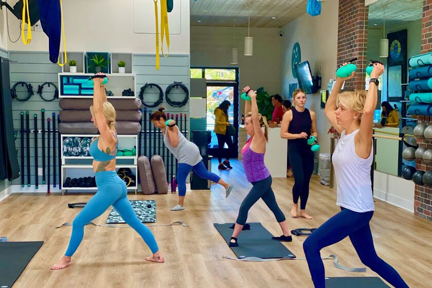A group fitness class at MB Fit Studio.