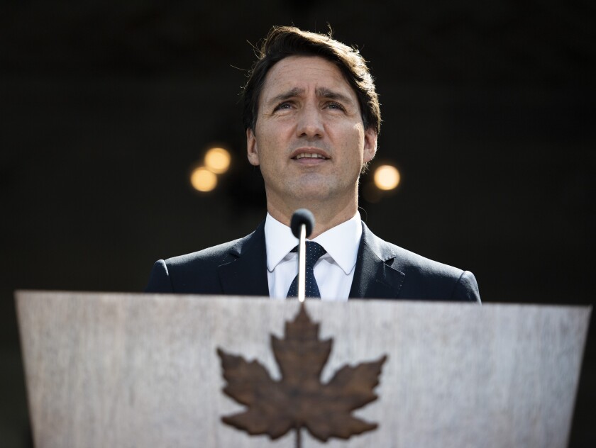 Prime Minister Justin Trudeau speaks at a news conference at Rideau Hall after meeting with Gov. Gen. Mary Simon to ask her to dissolve Parliament, triggering an election, in Ottawa, Ontario, on Sunday, Aug. 15, 2021. (Justin Tang/The Canadian Press via AP)