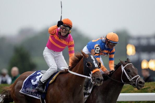 Jose Valdivia, Jr. rides Ruler on Ice to victory during the 143rd running of the Belmont Stakes at Belmont Park on June 11, 2011 in Elmont, New York.
