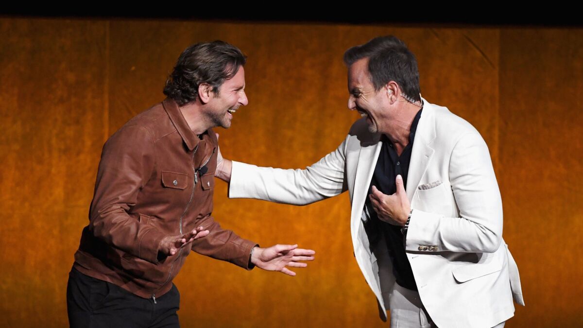 Bradley Cooper and Will Arnett present the trailer for the Warner Bros. movie "A Star Is Born" at CinemaCon in Las Vegas.