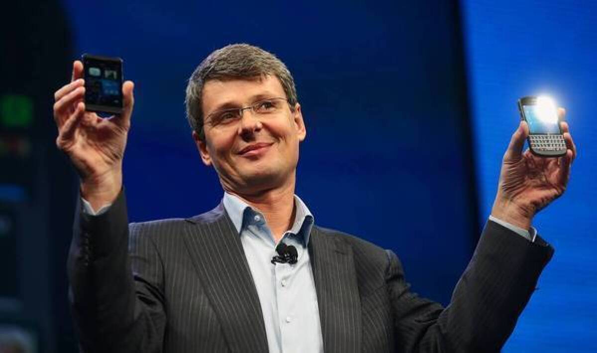 BlackBerry Chief Executive Thorsten Heins displays the BlackBerry 10 smartphone at an event in New York in January. BlackBerry has signed a letter of intent to be bought by a consortium led by Fairfax Financial Holdings Limited.