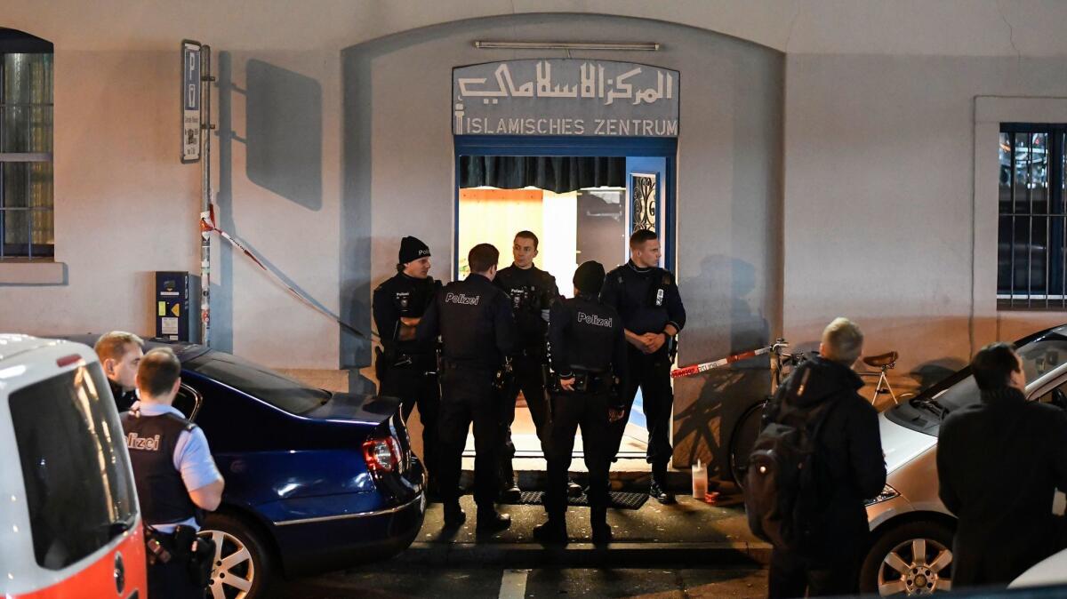 Police secure the area in front of an Islamic center in Zurich on Monday.