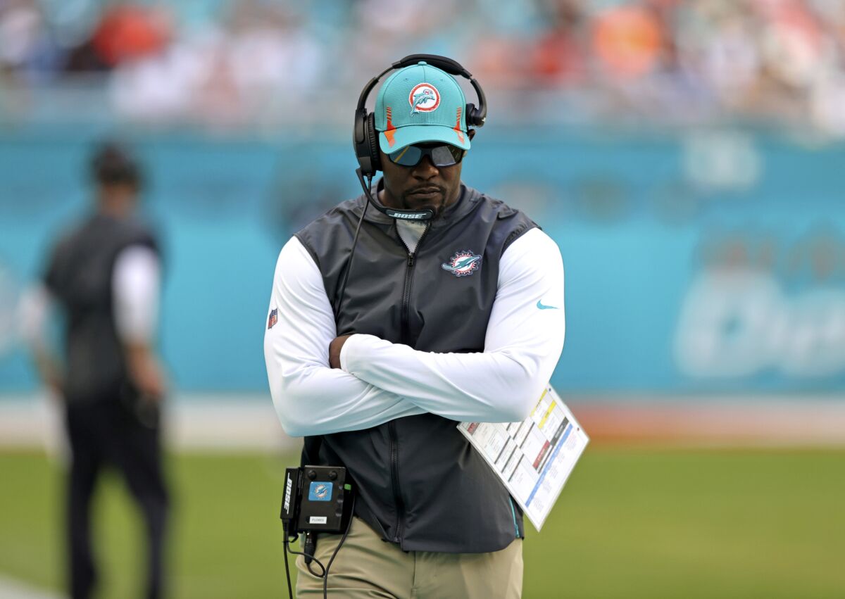 Miami Dolphins head coach Brian Flores looks from the sidelines during the third quarter of an NFL football game against the Indianapolis Colts on Sunday, Oct. 3, 2021, in Miami Gardens, Fla. (David Santiago/Miami Herald via AP)