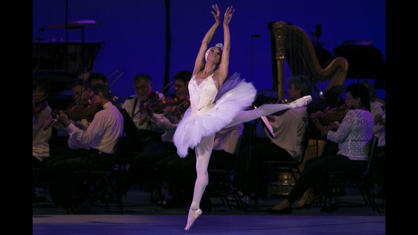 Misty Copeland peforms Odette's solo from Thaikovsky's "Swan Lake" as part of a Los Angeles Philharmonic program of ballet music at the Hollywood Bowl.