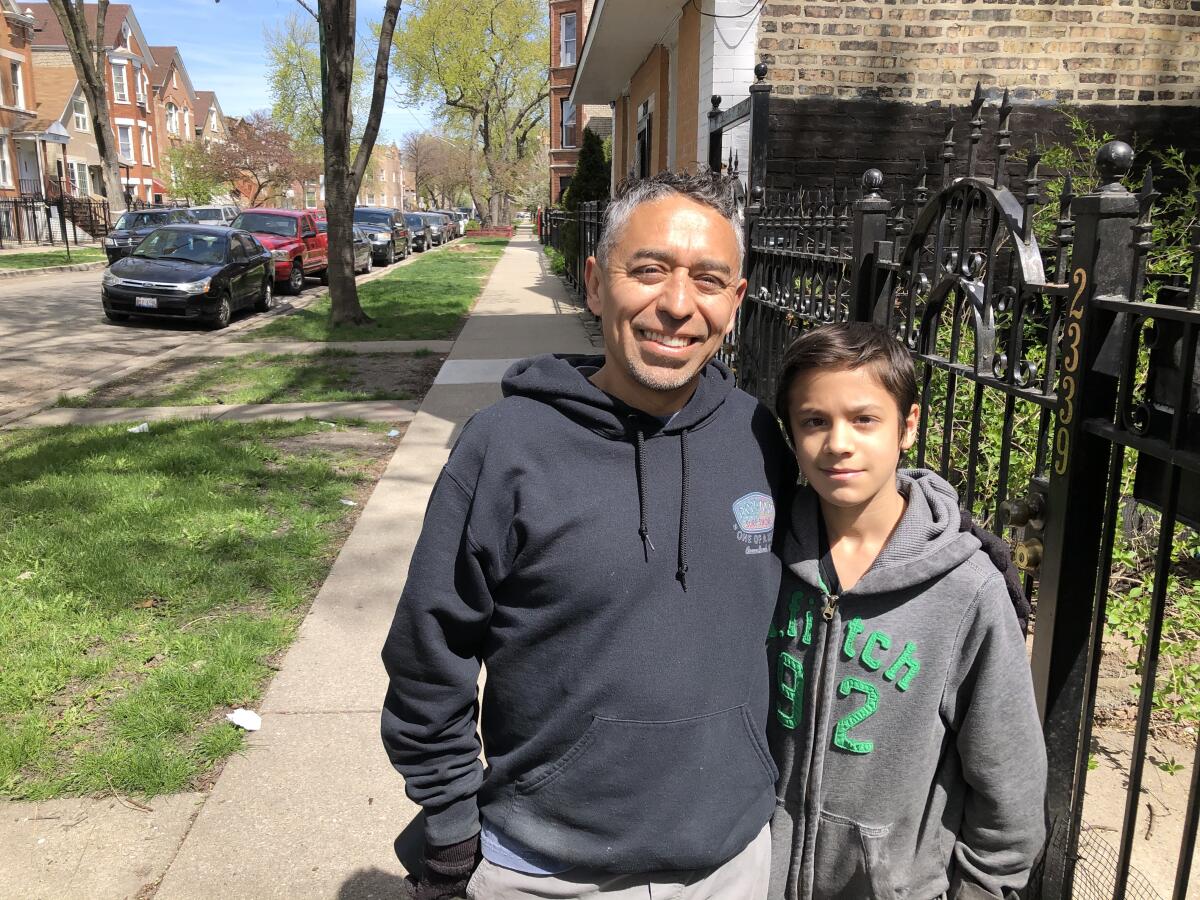 The Rev. Paco Amador and son Daniel, 14