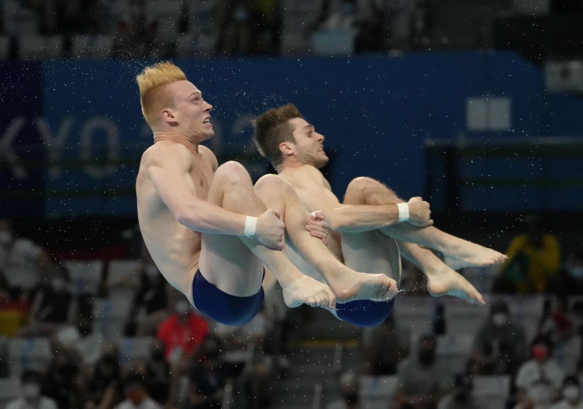 U.S. divers Andrew Capobianco and Michael Hixon compete in the men's synchronized three-meter springboard final.