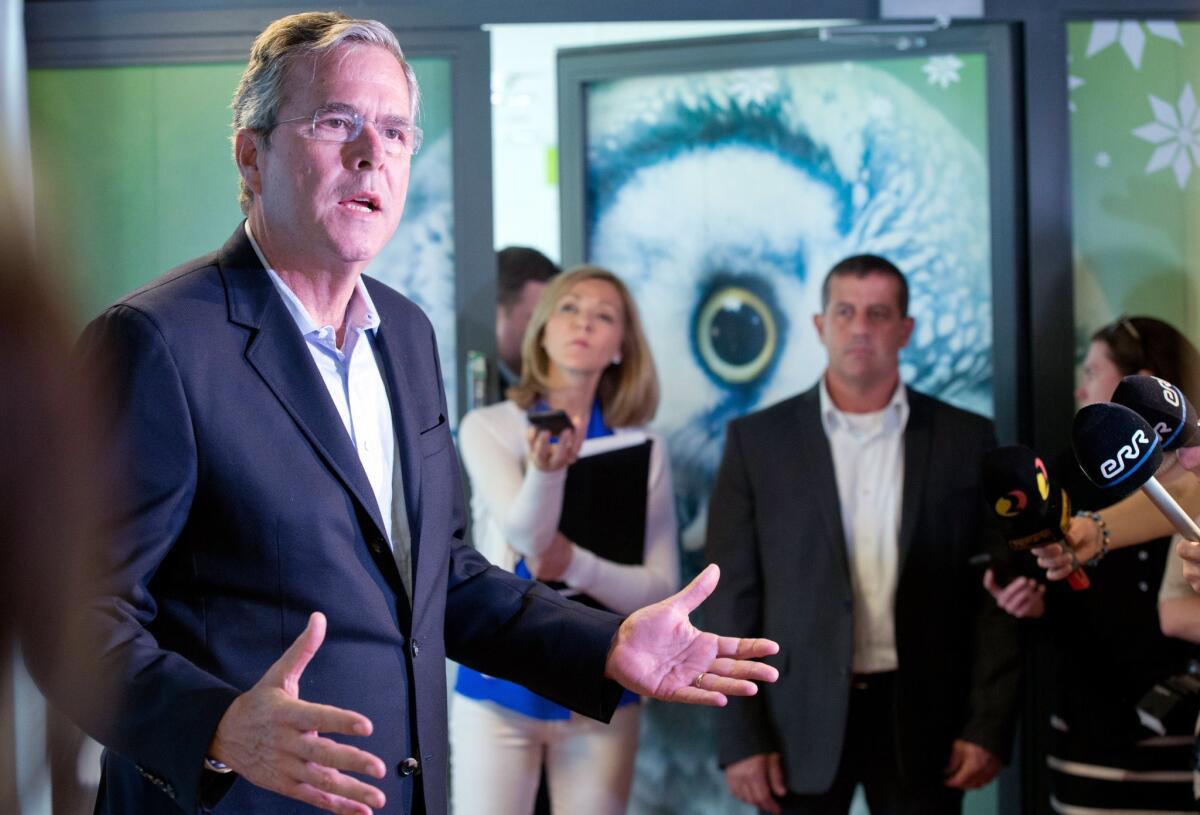 Former Florida Gov. Jeb Bush speaks to journalists at the e-Estonia Showroom during his visit in Tallinn, Estonia, Saturday, June 13, 2015.