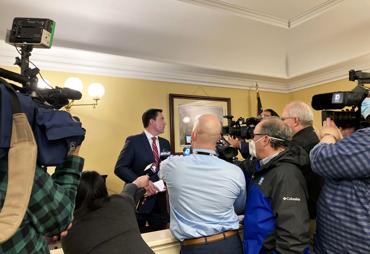 Ohio Secretary of State Frank LaRose speaks to reporters after a meeting of the Ohio Redistricting Commission on Wednesday, Feb. 23, 2022, at the Ohio Statehouse in Columbus, Ohio. (AP Photo/Julie Carr Smyth)